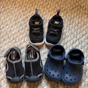 Three pairs of toddler boy shoes